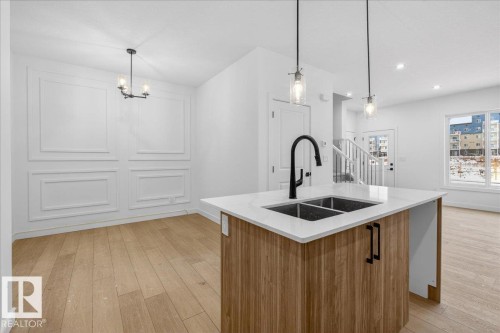 131 Creekside Lane, Leduc, AB - Indoor Photo Showing Kitchen With Double Sink