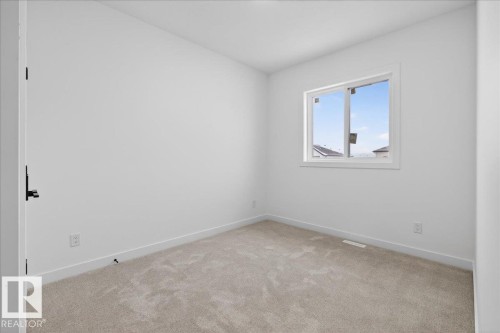131 Creekside Lane, Leduc, AB - Indoor Photo Showing Other Room