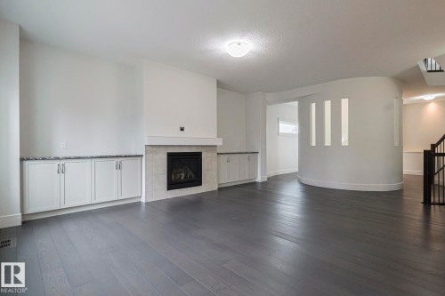 3167 Winspear Crescent Sw, Edmonton, AB - Indoor Photo Showing Living Room With Fireplace
