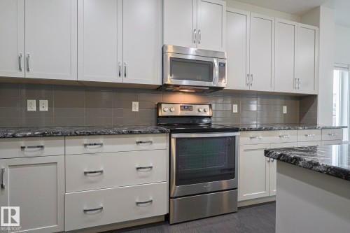 3167 Winspear Crescent Sw, Edmonton, AB - Indoor Photo Showing Kitchen With Upgraded Kitchen