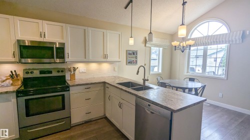 13817 131A Avenue, Edmonton, AB - Indoor Photo Showing Kitchen With Double Sink