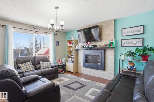 16734 122A Street, Edmonton, AB - Indoor Photo Showing Living Room With Fireplace