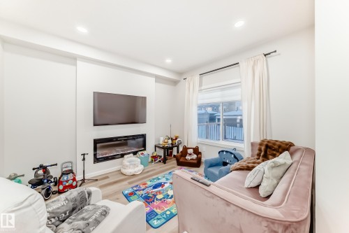 332 29 Street, Edmonton, AB - Indoor Photo Showing Living Room With Fireplace