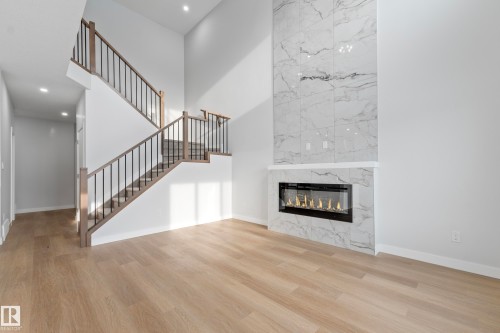 11 Westwyck, Spruce Grove, AB - Indoor Photo Showing Living Room With Fireplace