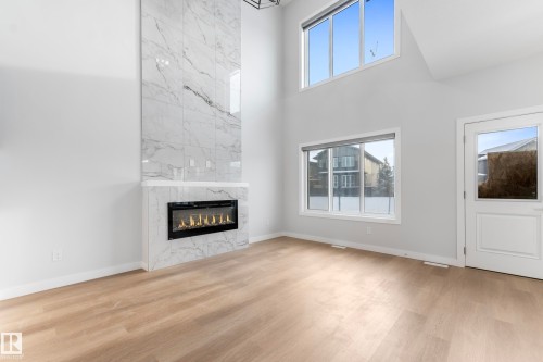 11 Westwyck, Spruce Grove, AB - Indoor Photo Showing Living Room With Fireplace