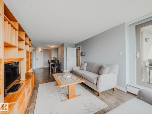600 10149 Saskatchewan Drive, Edmonton, AB - Indoor Photo Showing Living Room With Fireplace