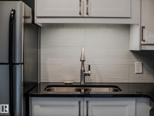 600 10149 Saskatchewan Drive, Edmonton, AB - Indoor Photo Showing Kitchen With Double Sink With Upgraded Kitchen