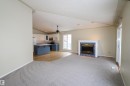 Morinville, AB  - Indoor Photo Showing Living Room With Fireplace 