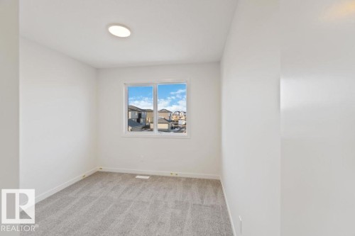 7106 50A Avenue, Beaumont, AB - Indoor Photo Showing Other Room