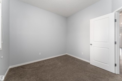 56 3305 Orchards Link Sw, Edmonton, AB - Indoor Photo Showing Other Room