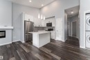 56 3305 Orchards Link Sw, Edmonton, AB  - Indoor Photo Showing Kitchen With Stainless Steel Kitchen 