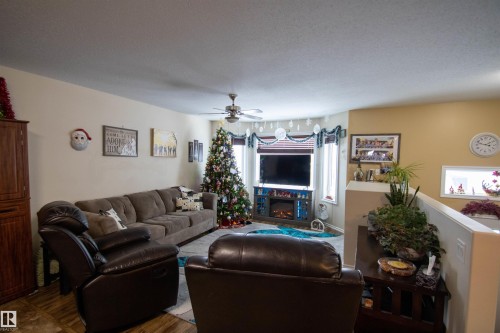 1 5913 48 Ave, St. Paul Town, AB - Indoor Photo Showing Living Room With Fireplace