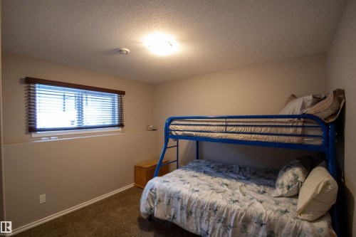 1 5913 48 Ave, St. Paul Town, AB - Indoor Photo Showing Bedroom