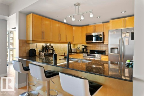 1104 10046 117 Street, Edmonton, AB - Indoor Photo Showing Kitchen With Double Sink