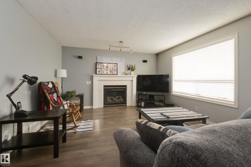 4403 151 Avenue, Edmonton, AB - Indoor Photo Showing Living Room With Fireplace
