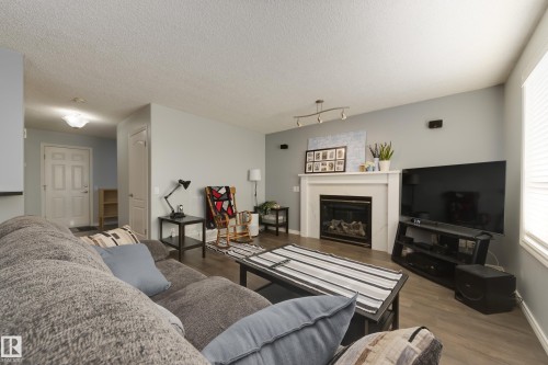 4403 151 Avenue, Edmonton, AB - Indoor Photo Showing Living Room With Fireplace