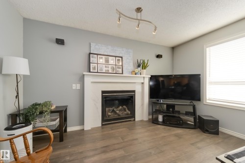 4403 151 Avenue, Edmonton, AB - Indoor Photo Showing Living Room With Fireplace