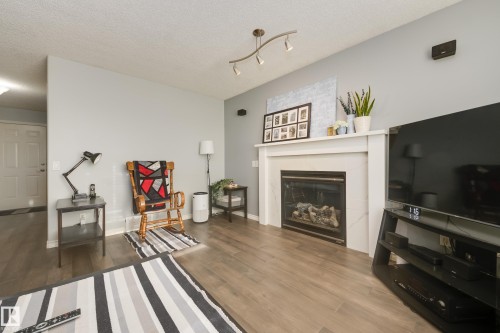 4403 151 Avenue, Edmonton, AB - Indoor Photo Showing Living Room With Fireplace