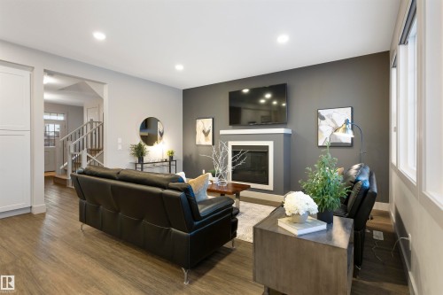 3925 Cherry Cove Cove, Edmonton, AB - Indoor Photo Showing Living Room With Fireplace