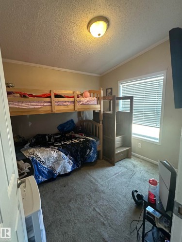 #1 5102 51 Avenue, Fort Kent, AB - Indoor Photo Showing Bedroom