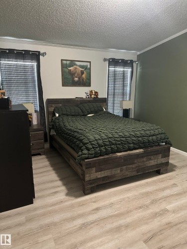 #1 5102 51 Avenue, Fort Kent, AB - Indoor Photo Showing Bedroom