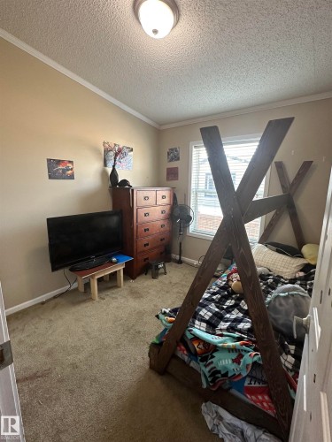 #1 5102 51 Avenue, Fort Kent, AB - Indoor Photo Showing Bedroom