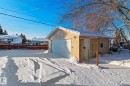 Snow covered garage featuring a garage - 315 10 Street, Cold Lake, AB  - Outdoor 