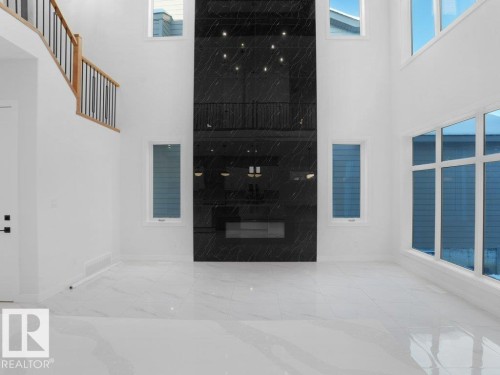 View of living room with fireplace - 6131 Crawford Drive, Edmonton, AB -  With Exterior