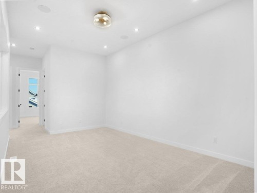 Bonus room featuring light carpet and recessed lighting - 6131 Crawford Drive, Edmonton, AB - Indoor Photo Showing Other Room