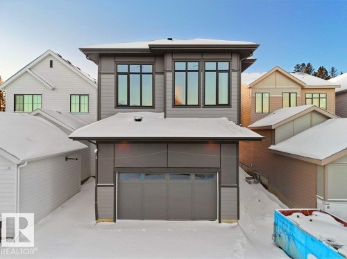 Modern home featuring a garage - 6131 Crawford Drive, Edmonton, AB - Outdoor With Exterior