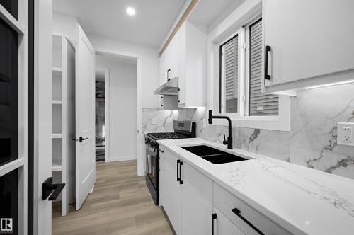 2020 Collip Crescent Sw, Edmonton, AB - Indoor Photo Showing Kitchen With Double Sink