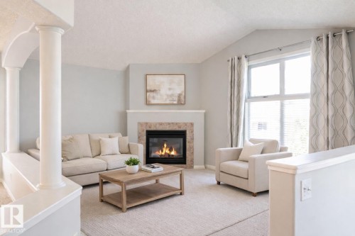 536 Leger Way, Edmonton, AB - Indoor Photo Showing Living Room With Fireplace