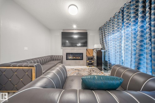 3445 Checknita Terrace, Edmonton, AB - Indoor With Fireplace