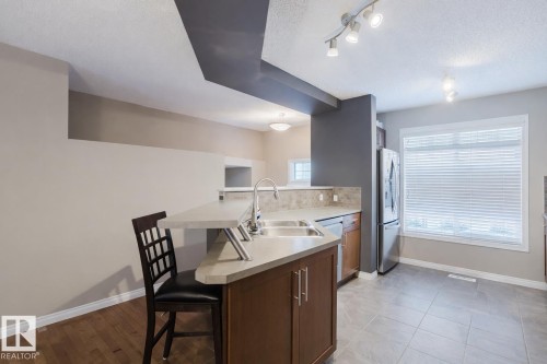 81 1804 70 Street, Edmonton, AB - Indoor Photo Showing Kitchen With Double Sink