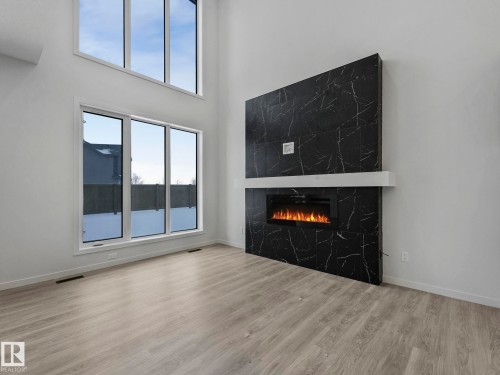2203 158 Street, Edmonton, AB - Indoor Photo Showing Other Room With Fireplace