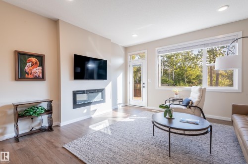 179 Redwing Wynd, St. Albert, AB - Indoor Photo Showing Living Room With Fireplace