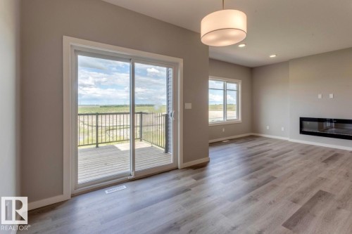 40 Gambel Loop, Spruce Grove, AB - Indoor Photo Showing Other Room With Fireplace