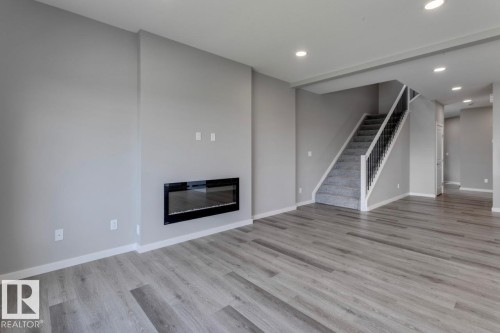 40 Gambel Loop, Spruce Grove, AB - Indoor Photo Showing Living Room With Fireplace