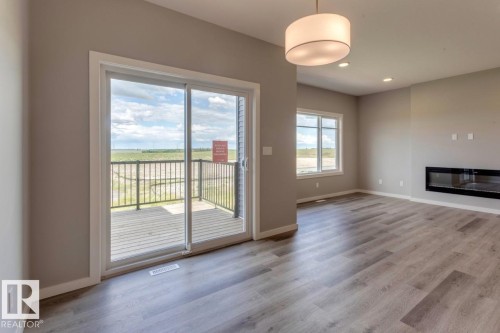 40 Gambel Loop, Spruce Grove, AB - Indoor Photo Showing Other Room With Fireplace