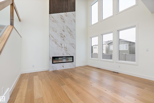 6887 Knox Loop Sw, Edmonton, AB - Indoor With Fireplace