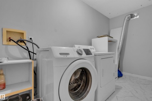 8F Meadowlark Village, Edmonton, AB - Indoor Photo Showing Laundry Room