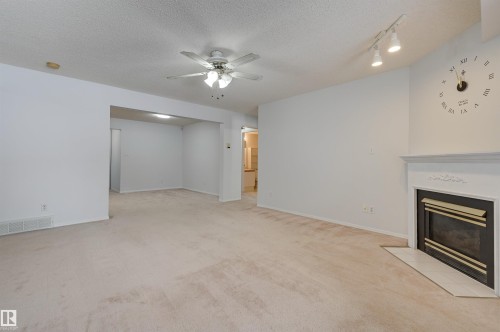 107 8903 106A Avenue, Edmonton, AB - Indoor With Fireplace