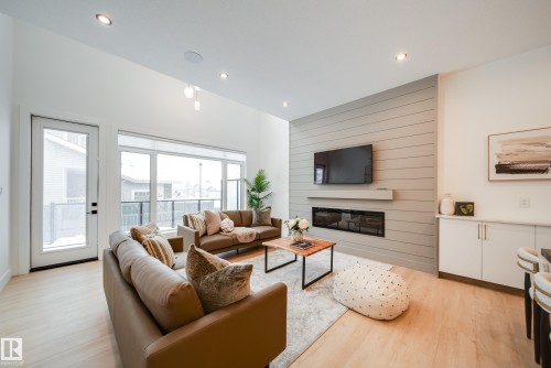 #2 20425 93 Avenue, Edmonton, AB - Indoor Photo Showing Living Room With Fireplace