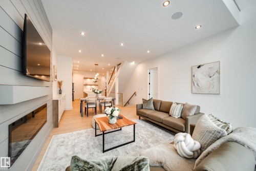 #2 20425 93 Avenue, Edmonton, AB - Indoor Photo Showing Living Room With Fireplace