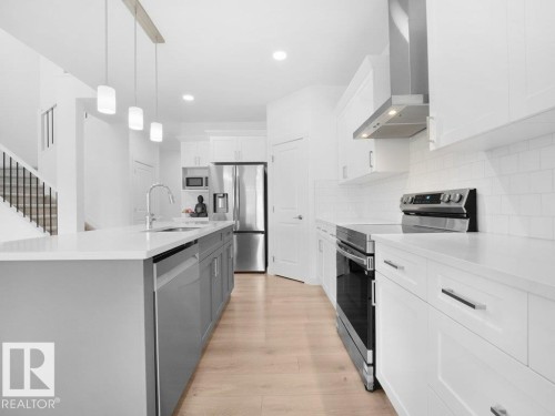 7020 177 Avenue, Edmonton, AB - Indoor Photo Showing Kitchen With Upgraded Kitchen