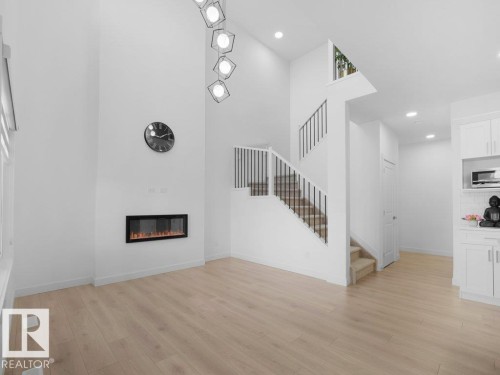 7020 177 Avenue, Edmonton, AB - Indoor With Fireplace