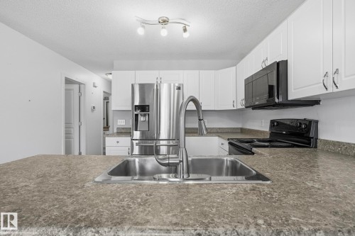 225 Brookview Way, Stony Plain, AB - Indoor Photo Showing Kitchen With Double Sink With Upgraded Kitchen