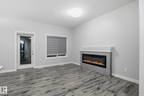 7438 Chivers Crescent, Edmonton, AB - Indoor Photo Showing Living Room With Fireplace
