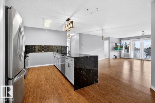309 278 Suder Greens Drive, Edmonton, AB - Indoor Photo Showing Kitchen With Stainless Steel Kitchen
