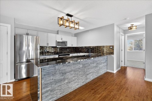 309 278 Suder Greens Drive, Edmonton, AB - Indoor Photo Showing Kitchen With Stainless Steel Kitchen